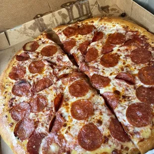 a pepperoni pizza in a box
