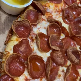 a slice of pepperoni pizza