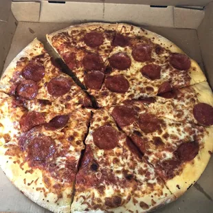 a pepperoni pizza in a box