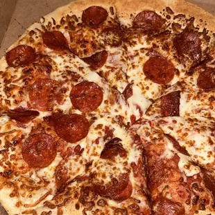 These are supposedly "extra most bestest" pizzas from little Caesar's but they look like REGULAR pizzas!