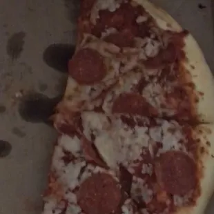 a slice of pepperoni pizza