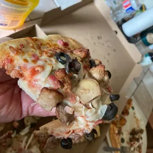 Soggy Little Caesar's pizza dribbling out of my hand.