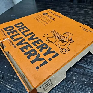 a pizza box on a table