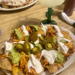1/2 Order Nachos Supreme with chicken.