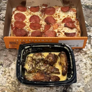 Pepperoni  pizza and chicken wings