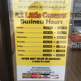 a business hours sign