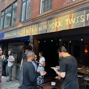 They hand out free slices everyday