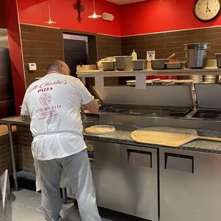 Tossing dough little charliea