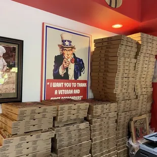 a stack of pizza boxes