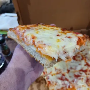 A nice, thick slice of the best Sicilian Pizza you will ever taste - a NY delicacy!