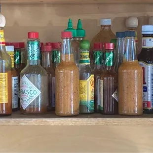 The sauce shelf, some commercial, some house made.  Go explore.