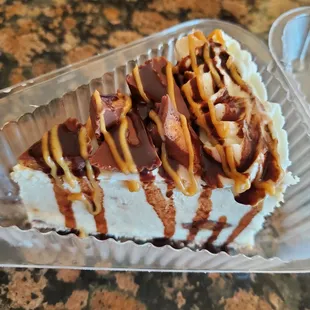 A huge slice of Reese's Cheesecake that will be shared