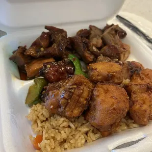 chicken and rice in a styrofoam container