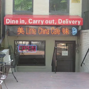 the front of the restaurant (along southbound MacArthur Blvd - recessed away from the curb and down a few steps)