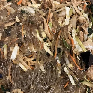 a stir fry with noodles and meat