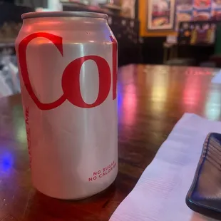 Diet Coke for the road with a side of sweet and sour pork and spicy noodle soup