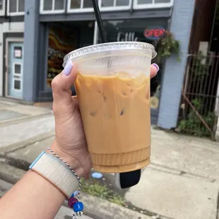 Iced vanilla latte with oat milk