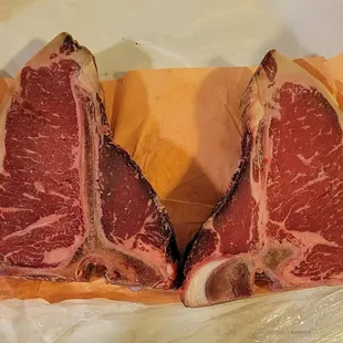 two pieces of meat on a piece of paper