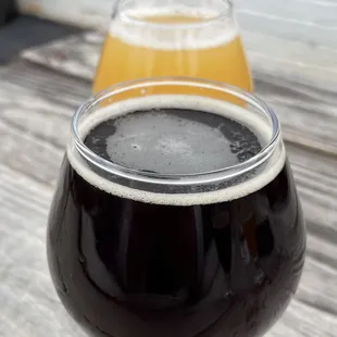 a glass of beer on a table