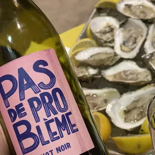 a person holding a bottle of wine