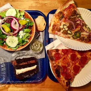 Greek salad, pepperoni pizza, the "slice of the day" (sausage, jalapeño, and onion), and colossal cake... A feast!