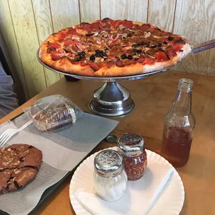 Medium pizza (8 good size slices), a slice of carrot cake and the most amazing chewy chocolate cookie.