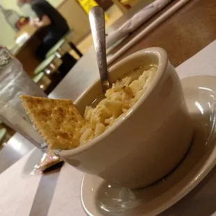 Eating some chicken noodle soup