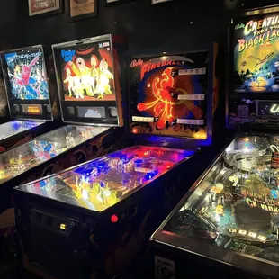 a row of pinball machines