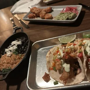 Parking lot tacos. Grilled Camerones, Fish tacos, rice and beans. Chefs