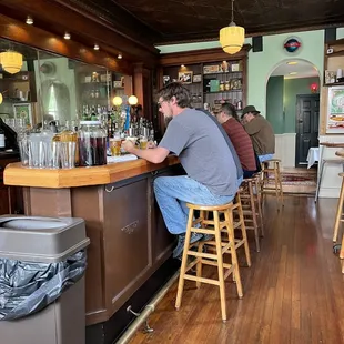 a man sitting at a bar