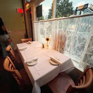 Window table when you walk in.