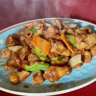 a plate of food on a red table