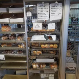 Fresh loaves, prices, and varieties.