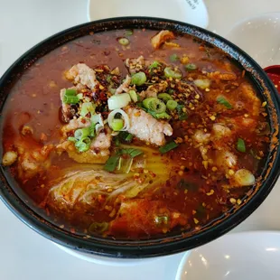 Spicy beef noodle with hot chili oil soup.