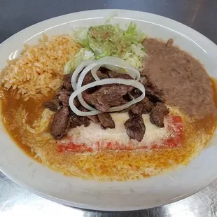 Enchiladas with beef fajitas
