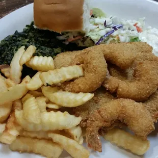 Fish and shrimp with fries, coleslaw and ... SPINACH? No thanks. Flavorless.