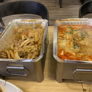 two pans of food on a table