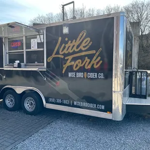 a food truck parked in a parking lot