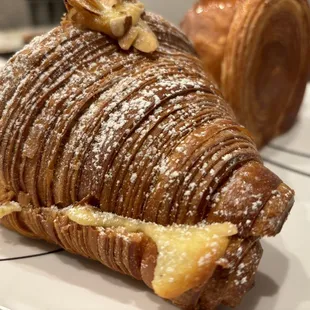 Almond croissant and croissant roll in the back--you can see the layers. Croissant done right!