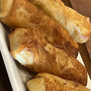 a close up of a plate of bread rolls