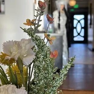 a vase of flowers on a table