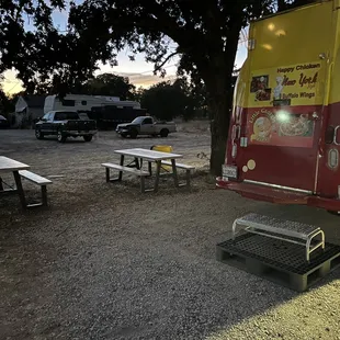 There are a few tables if you want to eat there.