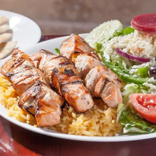Salmon Skewers served with Greek Salad &amp; Yellow Seasoned Rice!