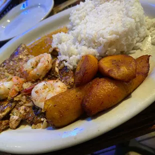 Shrimp and chicken, with plantains and white rice...can't wait to dig in...