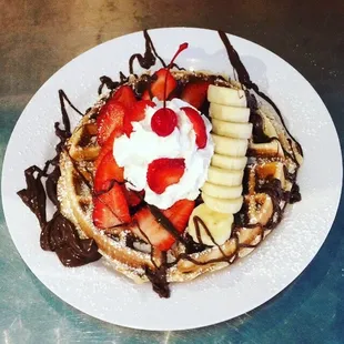 Belgian Waffle @ Little Heaven!!!  Banana, Strawberry, Nutella, powder sugar and whipped cream!!! Delicious!!!