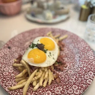 Truffled huevos rotos