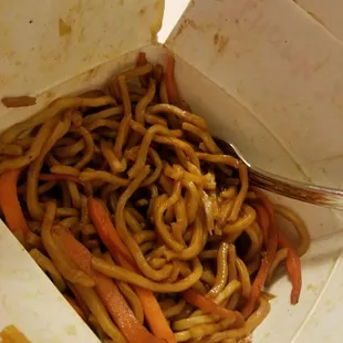 Plain lo mein noodles with carrots and onions  so much food