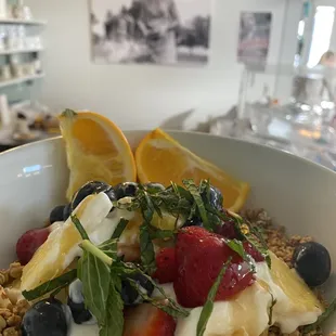 a bowl of fruit and yogurt