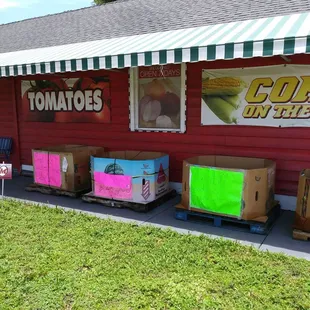 Side of the store with boxes full of watermelons