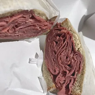 Corned beef on rye.  Slaw and dressing are on the side.